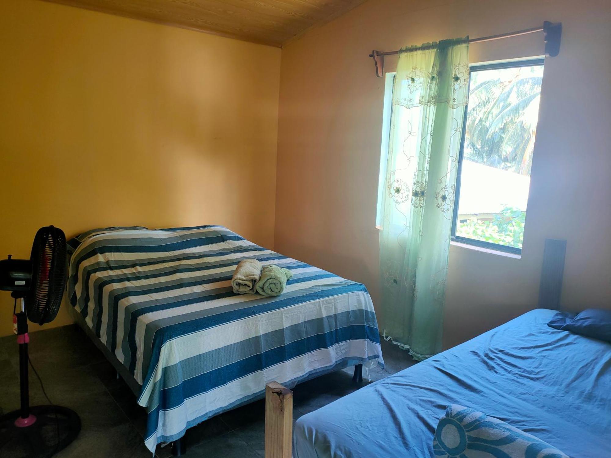 Guesthouse Island Escape South End Habitación foto